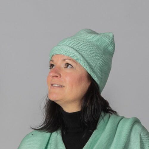 Handknitted merino beanie by INESKA — side view