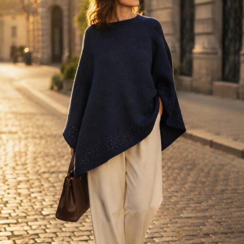 Handknitted navy blue merino poncho women, golden hour street — Dark Night INESKA