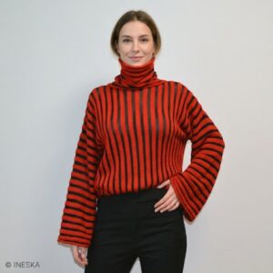 Handknitted red and black striped merino wool sweater Carmen by INESKA — worn by model, front view
