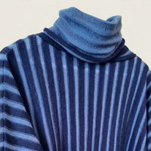 Turtleneck detail of handknitted Carmen sweater by INESKA
