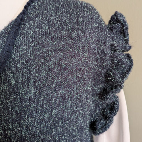 Handknitted navy vest with mint bouclé detail — INESKA