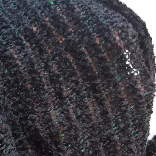 Close-up of handknitted black silk scarf — emerald lurex and sequins, INESKA