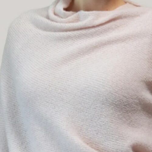 Handknitted Cherry Blossom sweater — soft bouclé texture close-up — INESKA Netherlands