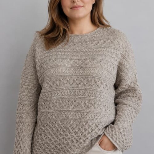 Woman wearing handknitted baby alpaca lace sweater in natural beige, close-up front view — INESKA Soul Song Sweater